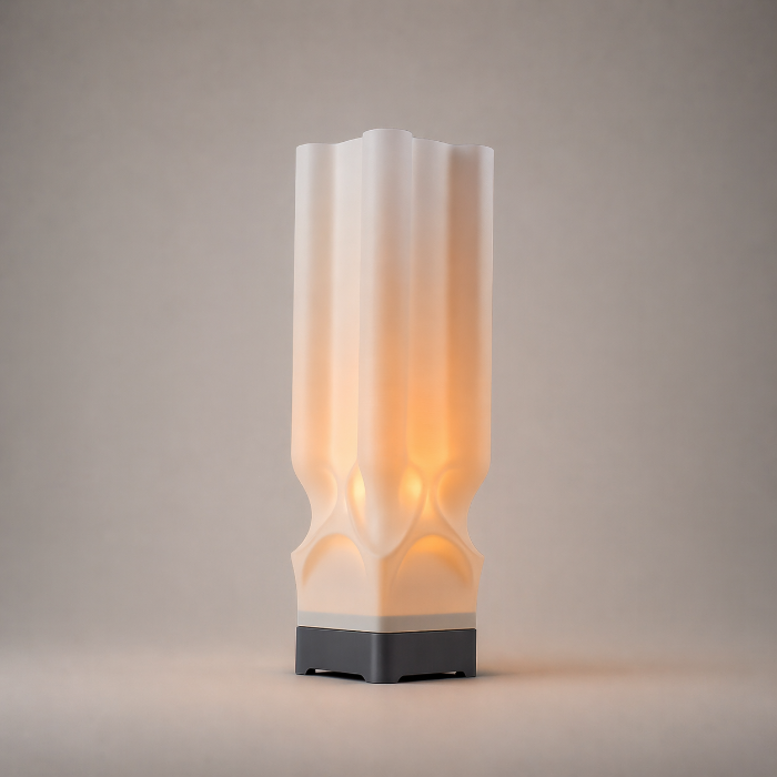 Decorative lamp with a textured white shade on a gray background