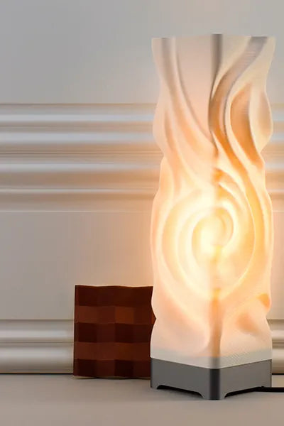 Decorative lamp with wavy design on a neutral background
