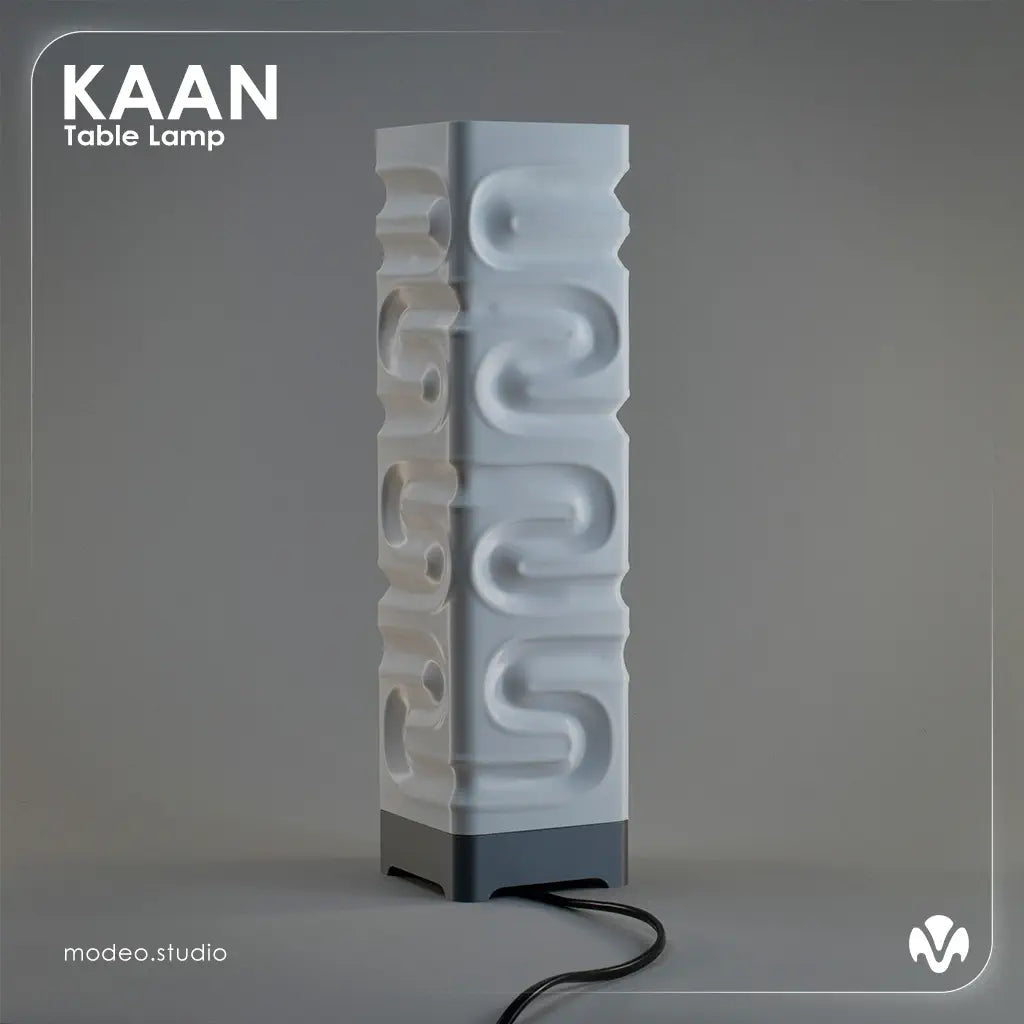 White matte textured table lamp with 'KAAN' branding on a gray background with the light turned of. Created by MODEO Design