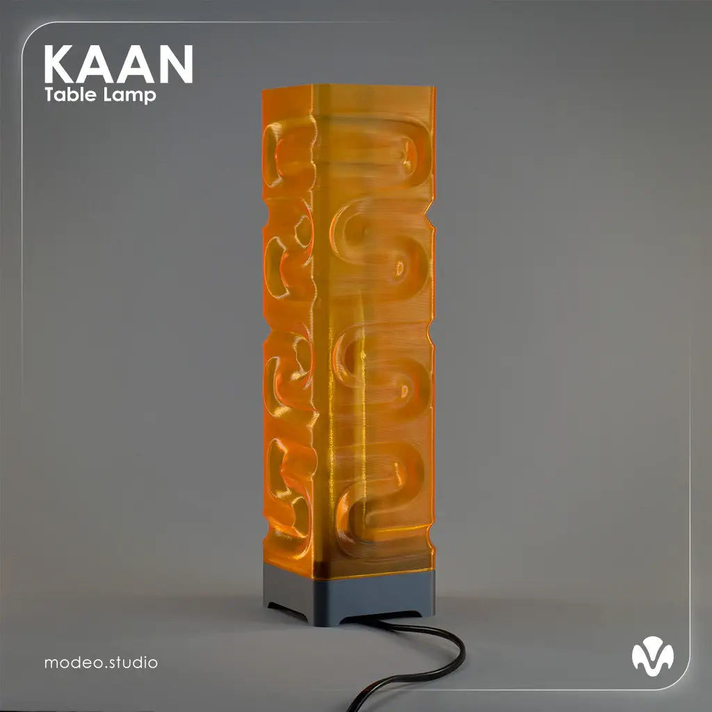 Orange translucid textured table lamp with 'KAAN' branding on a gray background with the light turned of. Created by MODEO Design